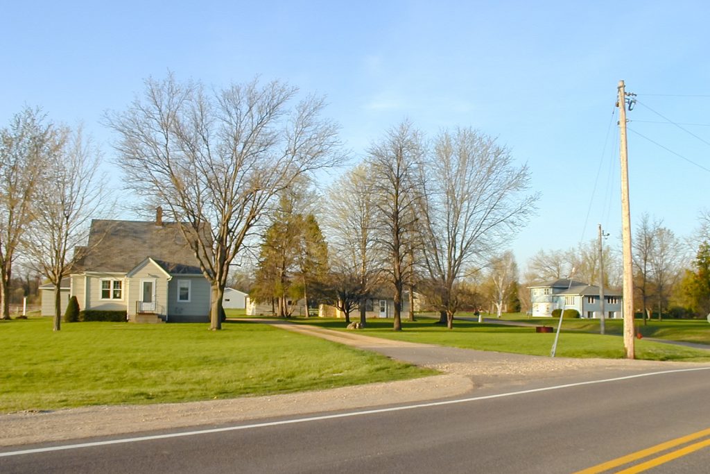 Photo by Rick Pepper - Mankato, MN - April 25, 2000 looking southeast from County Road 3 (Thompson Ravine Road) with John P. Huettl's house on the left.