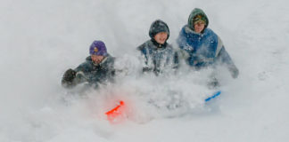 Photo by Rick Pepper - Alec Maertens, Jacob Pepper, Christian House on the Spring Lake Park sliding hill