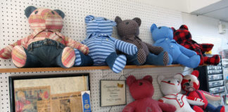 Photo by Grace Brandt - Memory bears at Pins and Needles Alterations in Mankato