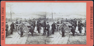 Photo from the Library of Congress - General William T. Sherman, center, leaning on the breach of a cannon, with his staff at Federal Fort No. 7 near Atlanta, Georgia in this stereopticon slide.