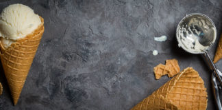 Vanilla ice cream on rustic background, top view