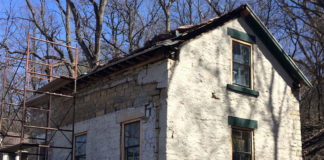 Photo by Mike Lagerquist – In April 2017, restoration work began. With the added front porch gone, the house’s original construction was revealed.