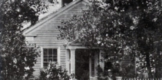 Photo Courtesy of Blue Earth County Historical Society - Home of Parsons King and Laura Johnson family in 1865. The house was built in 1854. L-R: Laura, Frank, Clarence, Parsons King, Charles and Julia.